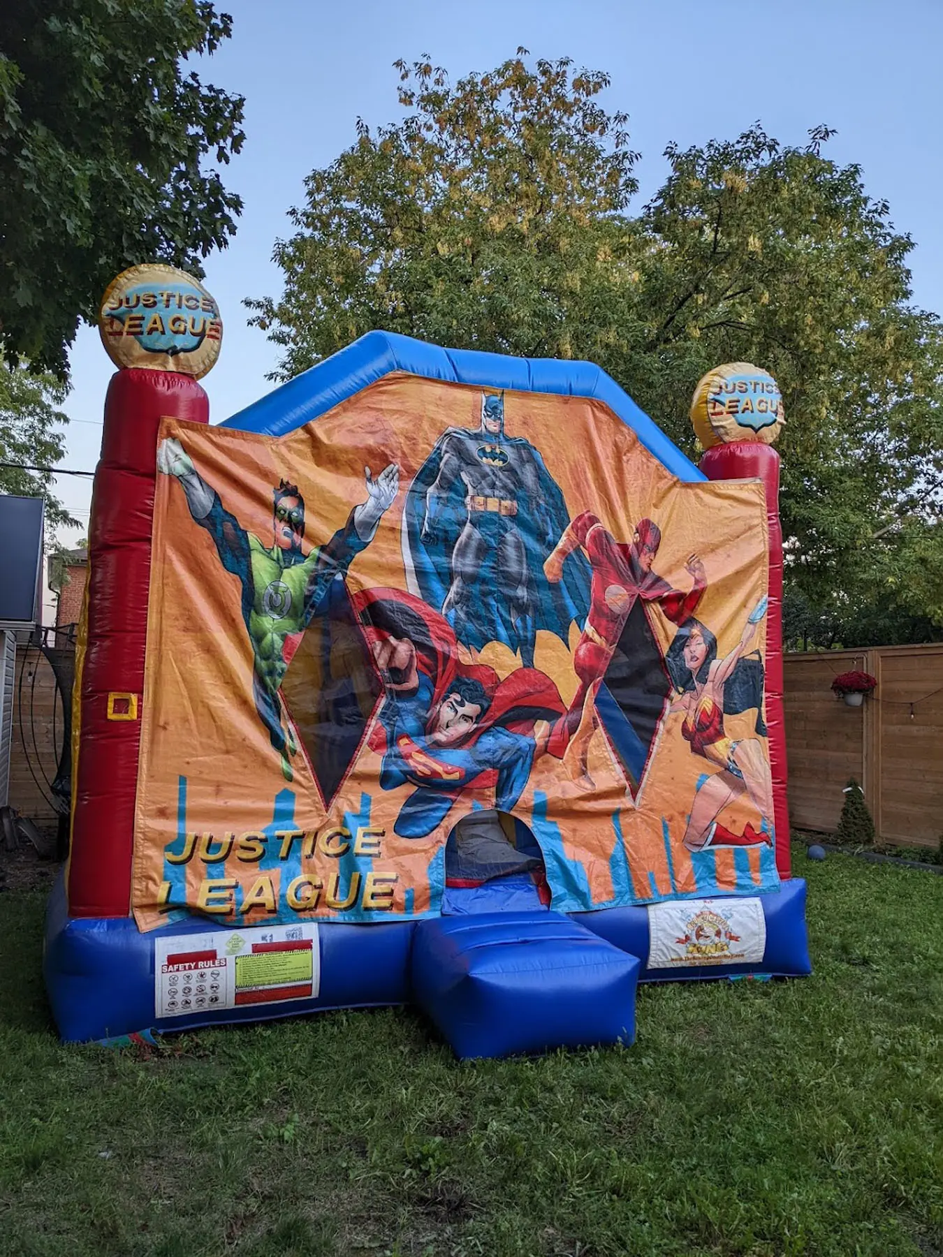 Justice League Combo Bouncy Castle inflatable rental gallery view 2 — The Bouncy Castle King, serving the GTA