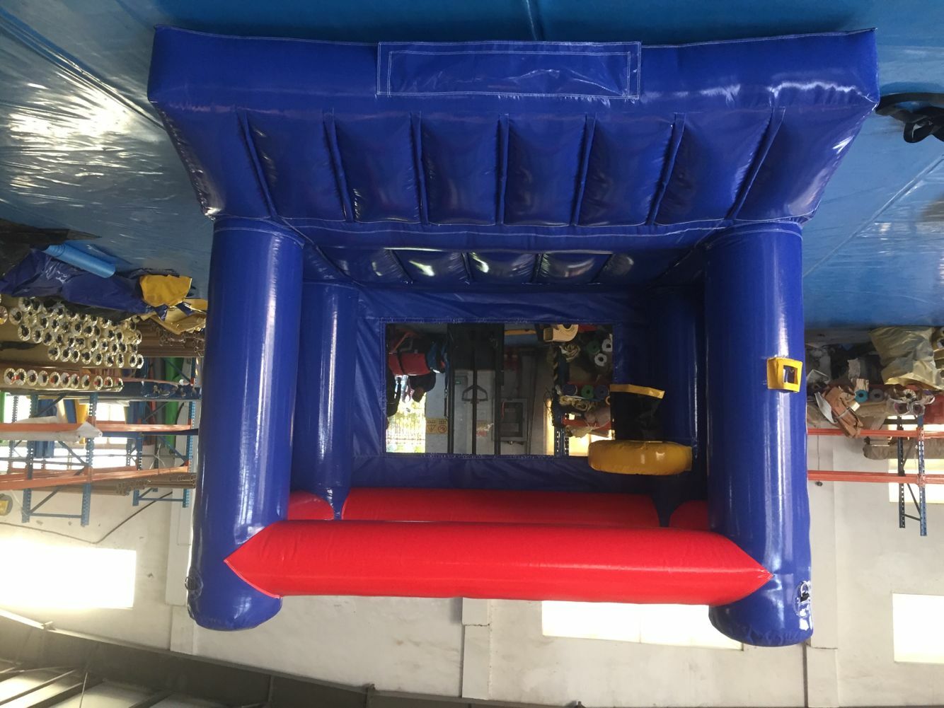 Small 10x10 Blue and Red inflatable rental full exterior — The Bouncy Castle King, serving the GTA