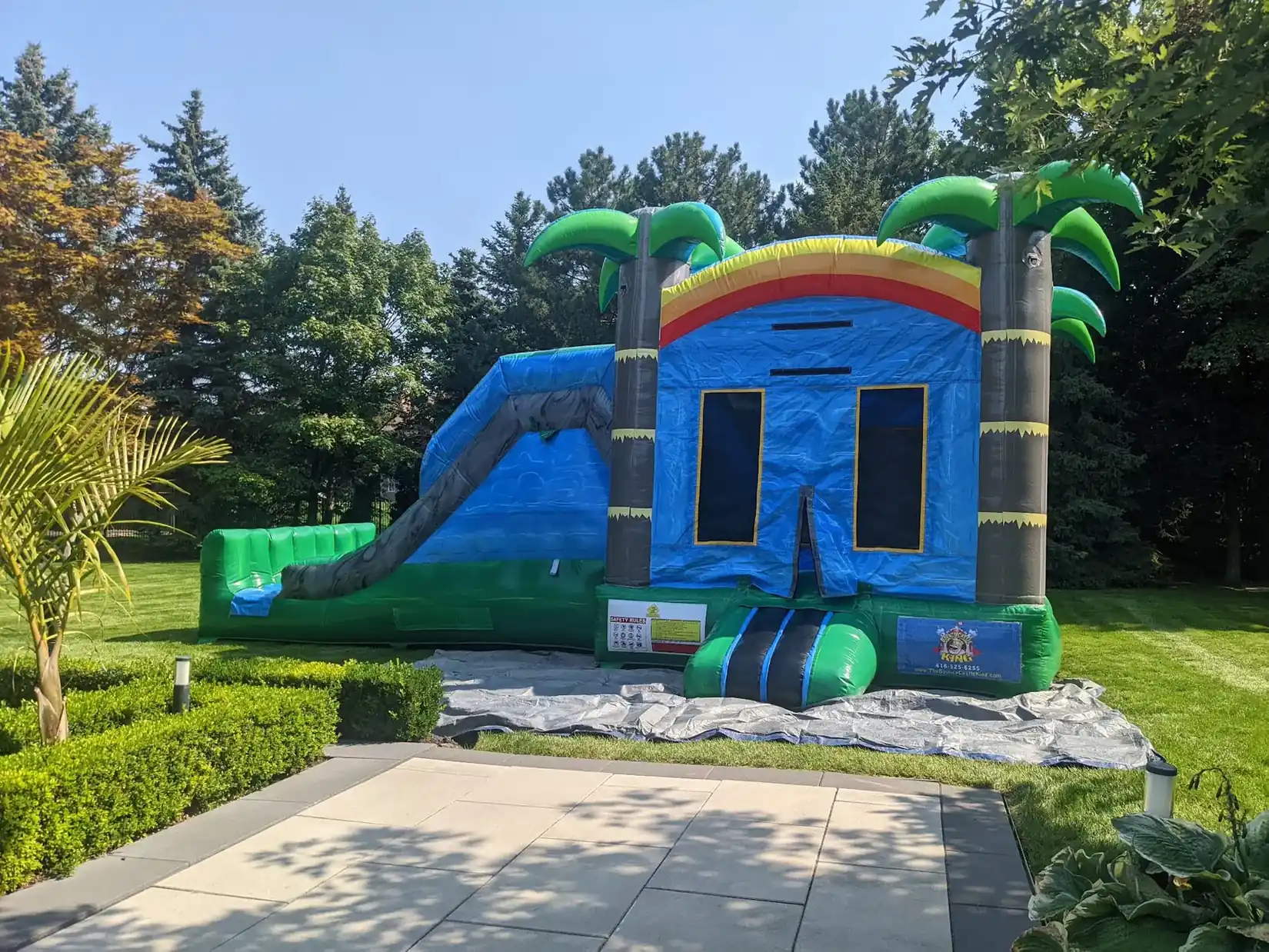 Double Slide Tropical Bouncy Castle inflatable rental gallery view 10 — The Bouncy Castle King, serving the GTA