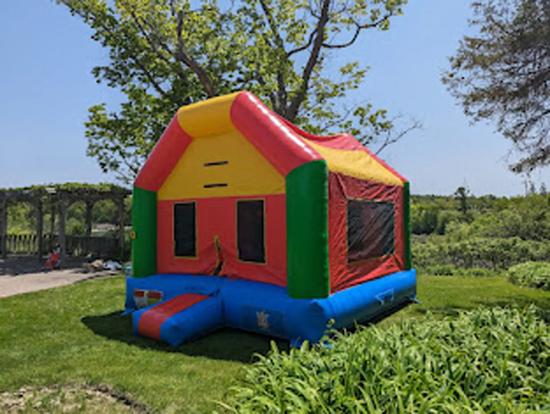 Colorful Bouncy Bouncy Castle (Adults Too) inflatable rental gallery view 3 — The Bouncy Castle King, serving the GTA