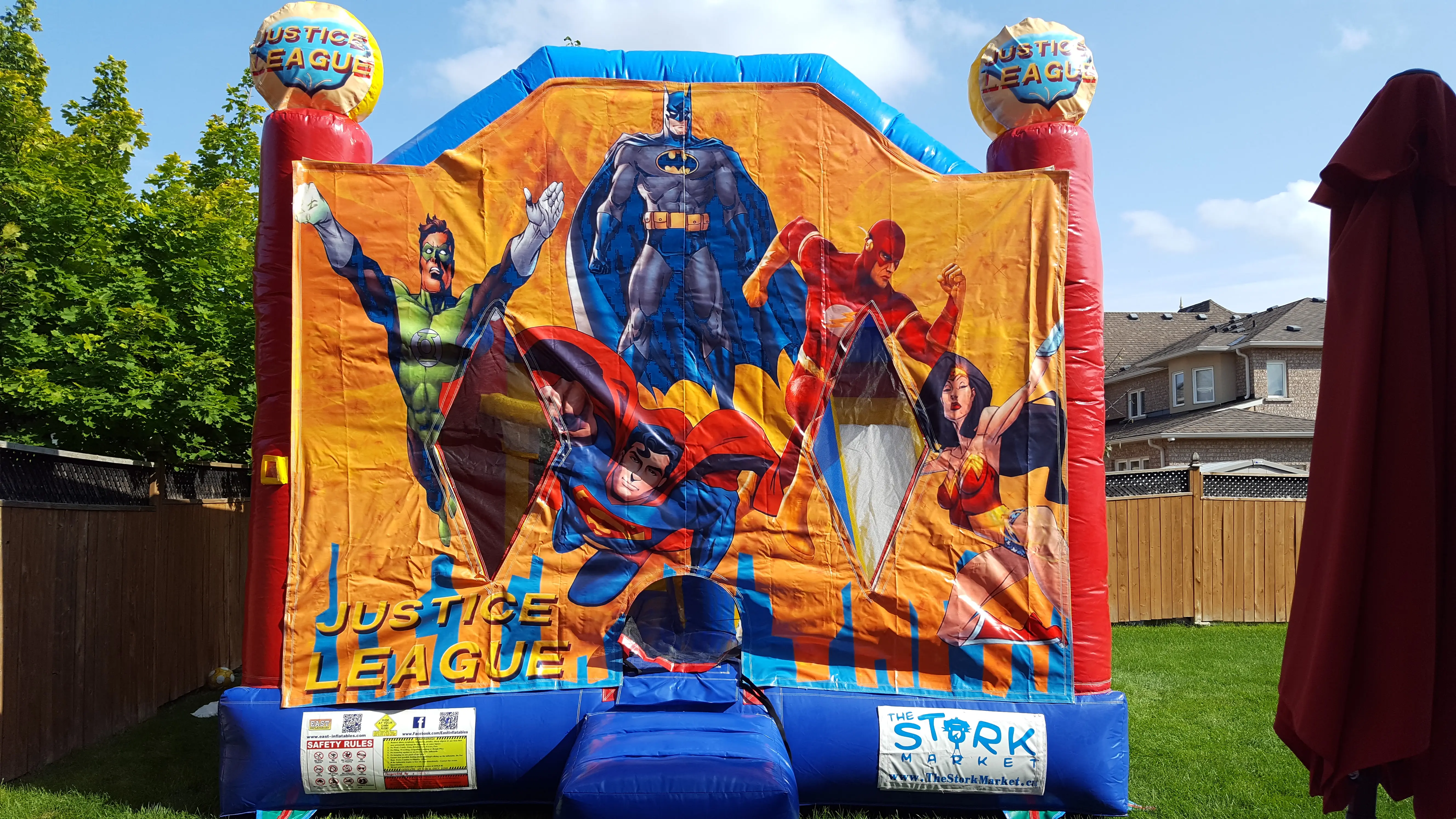 Justice League Combo Bouncy Castle inflatable rental full exterior β The Bouncy Castle King, serving the GTA