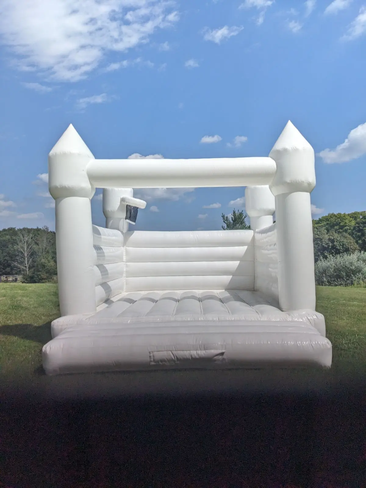 Pure White Bouncy Castle (Adults too) inflatable rental gallery view 4 — The Bouncy Castle King, serving the GTA