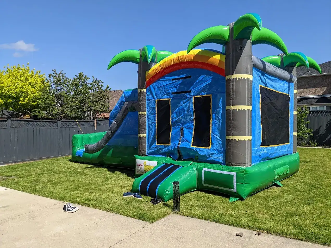 Double Slide Tropical Bouncy Castle inflatable rental gallery view 9 — The Bouncy Castle King, serving the GTA