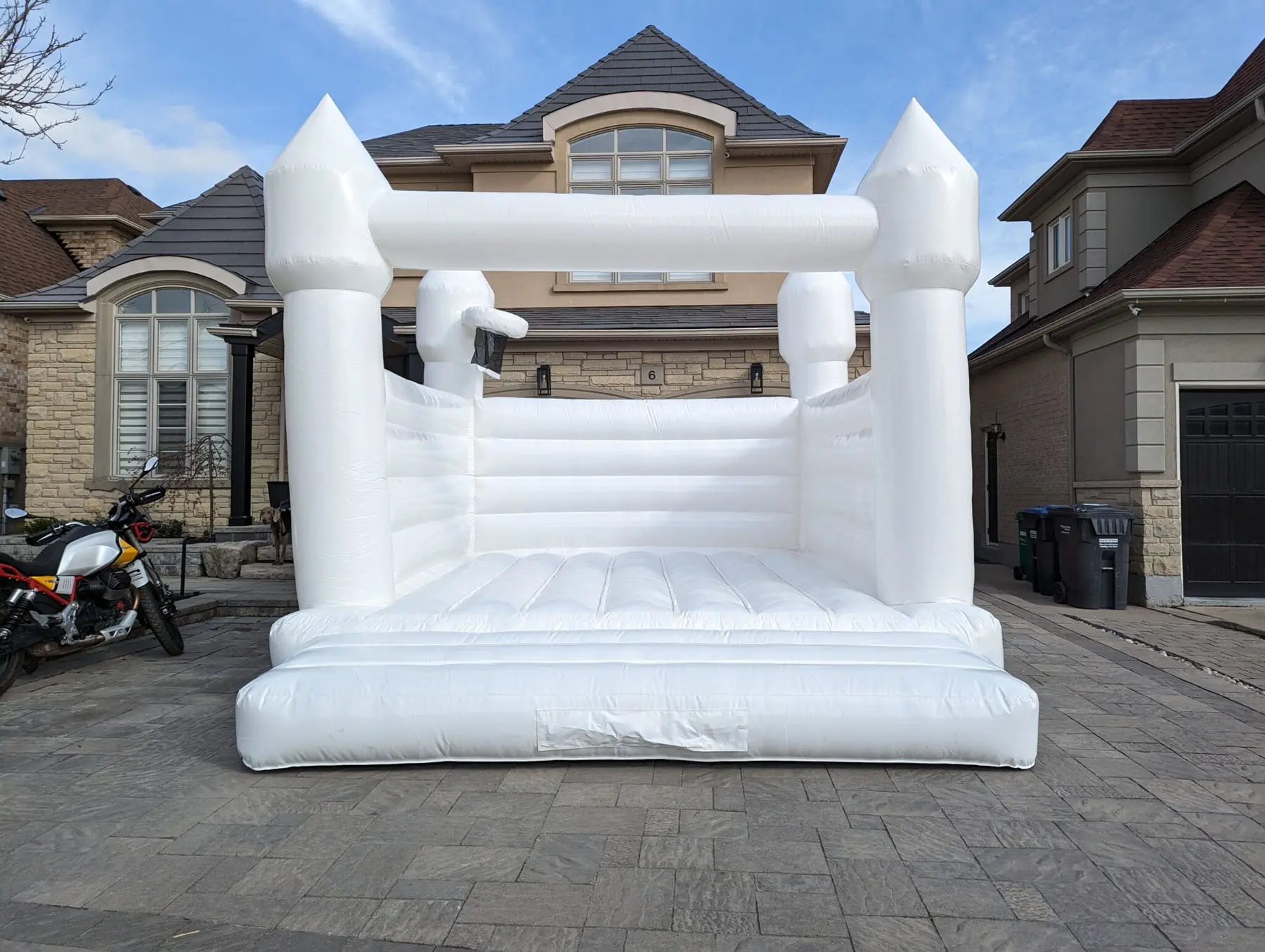 Pure White Bouncy Castle (Adults too) inflatable rental gallery view 2 — The Bouncy Castle King, serving the GTA