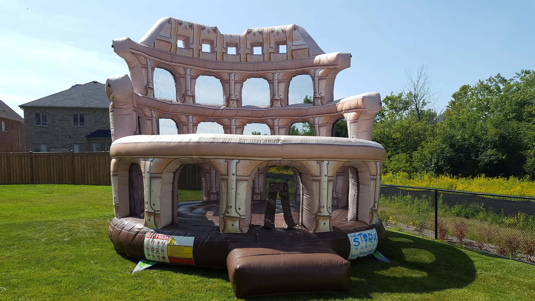 Roman Gladiator Colosseum Bouncy Castle (Adults Too) inflatable rental full exterior β The Bouncy Castle King, serving the GTA