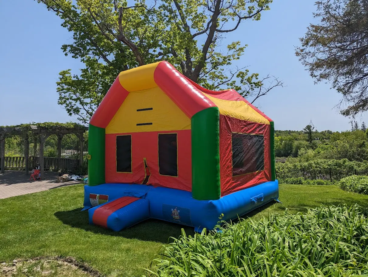 Colorful Bouncy Bouncy Castle (Adults Too) inflatable rental gallery view 2 — The Bouncy Castle King, serving the GTA